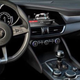 Illustration for article titled The New Alfa Romeo Giulias Interior Is A Carbon Fiber Wonderland